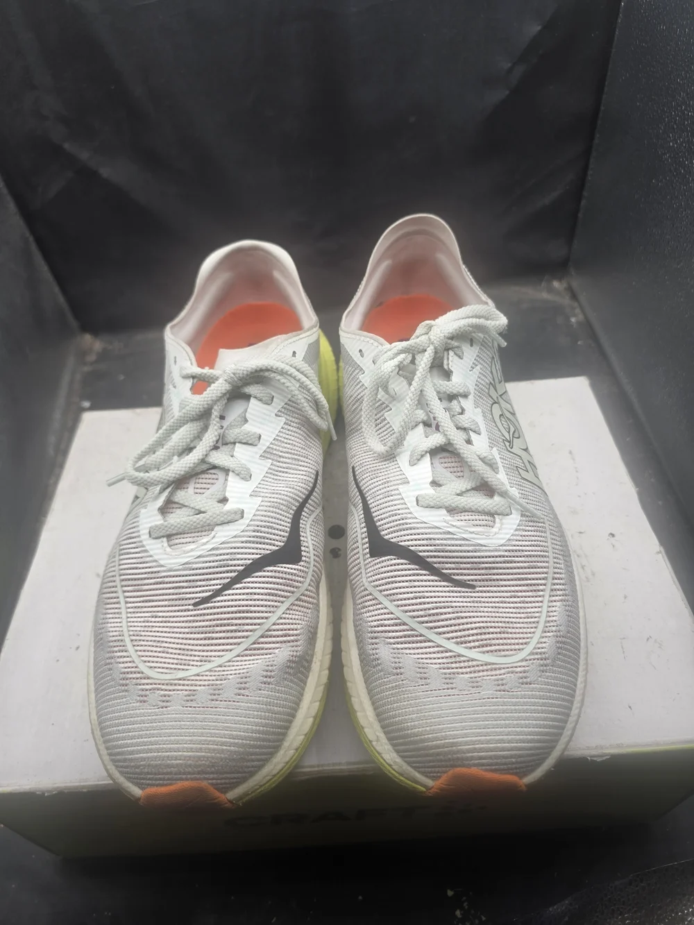 Hoka Kids White Sneakers with Black Swoosh and Orange Accents